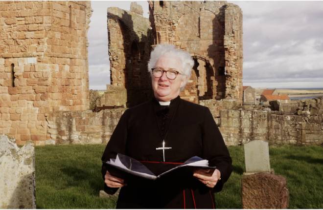 Rev Canon Sarah Hills at Holy Island, Northumberland