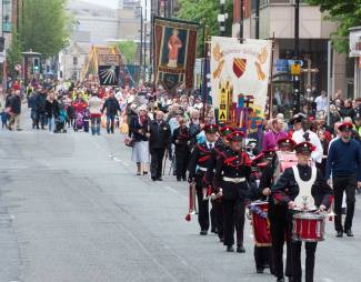 Procession down street for Whit walk