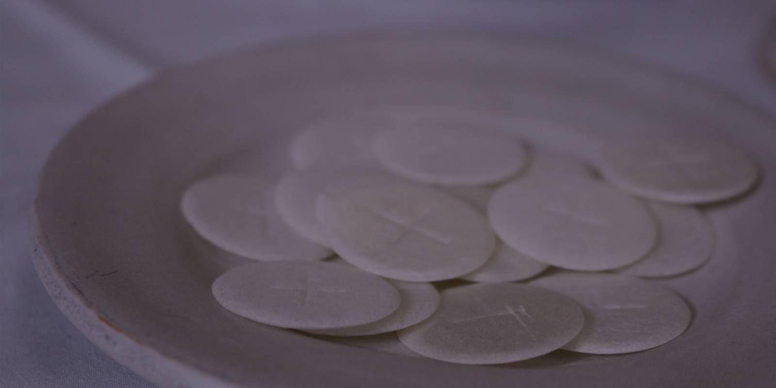 Communion wafers on a plate