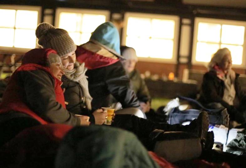 People taking part in a sleepout at night