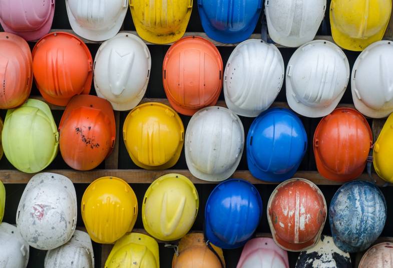 Close up of colourful hard hats