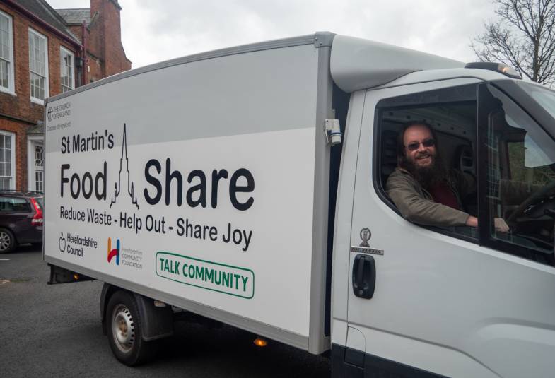David in the cab of the foodshare van outside The Bishop's Palace, Hereford