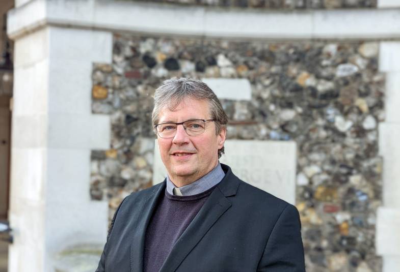 Bishop of Ebbsfleet Rob Munro standing in front of Church House