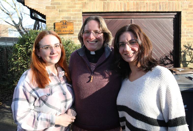 Three women smiling 