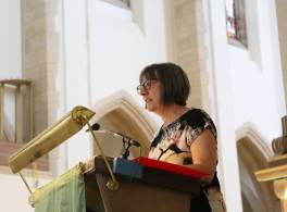 Woman  talking from Guildford Cathedral lectern