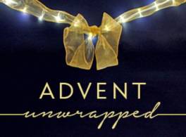 A gold bow with fairly lights on it and the words 'Advent unwrapped' underneath it