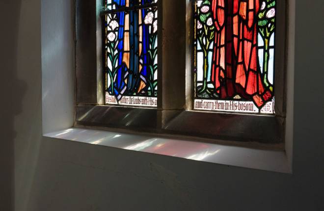 Stained glass windowsill with light reflections