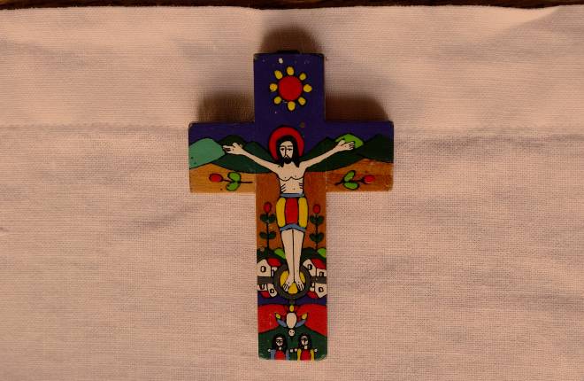 Romero cross lying on cloth