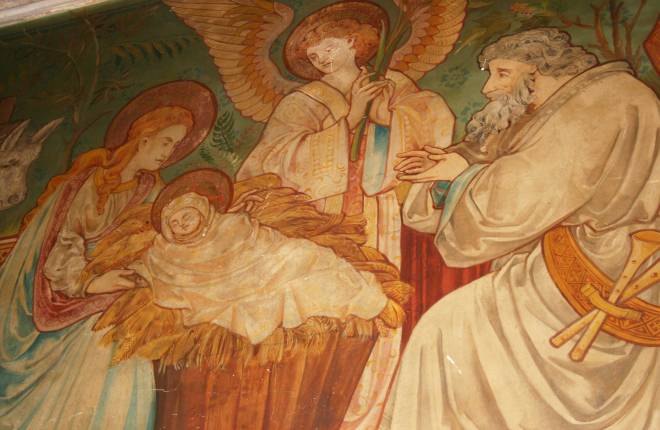 Wall painting of baby Jesus in the manger with Mary, Joseph and angel