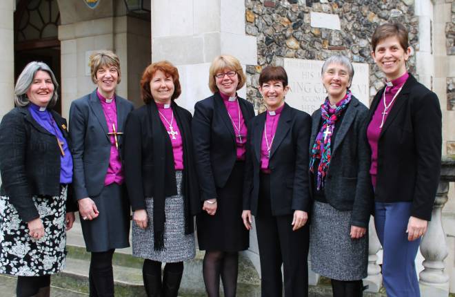 Female bishops standing outside Church House 