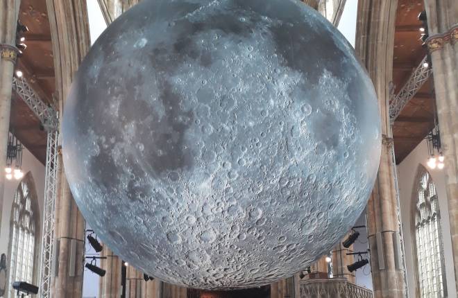 A moon installation at a cathedral.