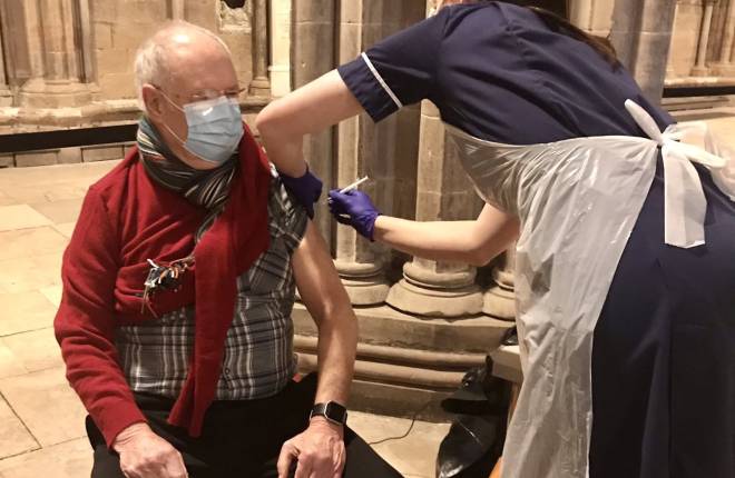 A man receives a vaccine jab in Lichfield Cathedral 
