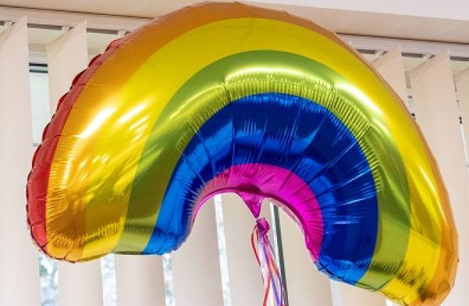 A foil rainbow balloon