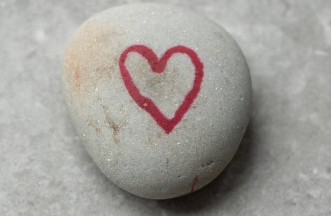 A heart drawn on a pebble 