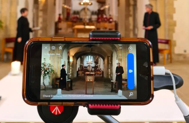 A phone is being used to record a church service