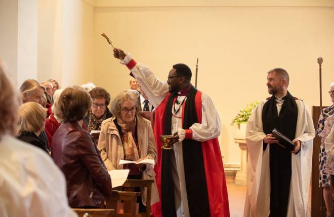 Rt Revd Lusa Nsenga-Ngoy, Bishop of Willesden, blessing St Lawrence, Eastcote