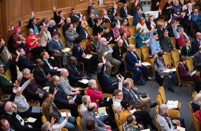 Members voting during a session at the London General Synod, February 2023