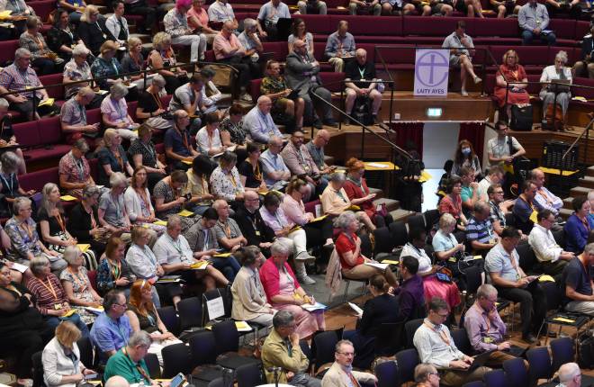 Members of the General Synod listen to a debate at the University of York's Central Hall